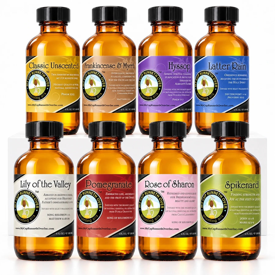 All eight My Cup Runneth Over anointing oils in 4 oz amber glass bottles: Classic Unscented, Frankincense & Myrrh, Hyssop, Latter Rain, Lily of the Valley, Pomegranate, Rose of Sharon and Spikenard